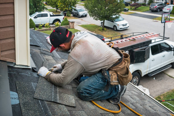 Professional Roofing technician working in Helena, OK